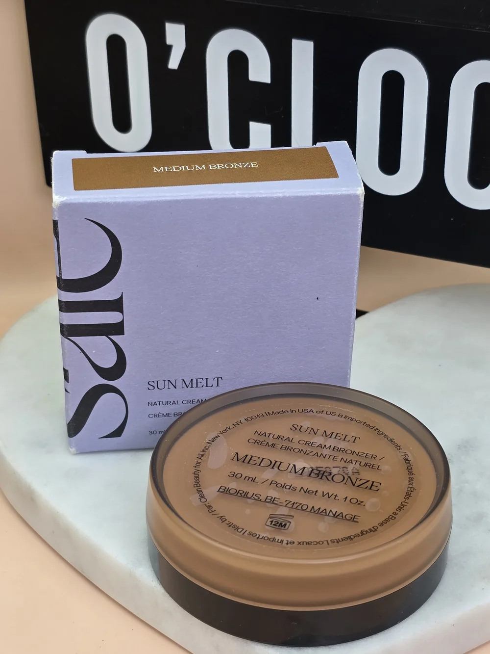 Saie Sun Melt Cream Bronzer in Medium Bronze with Black Compact